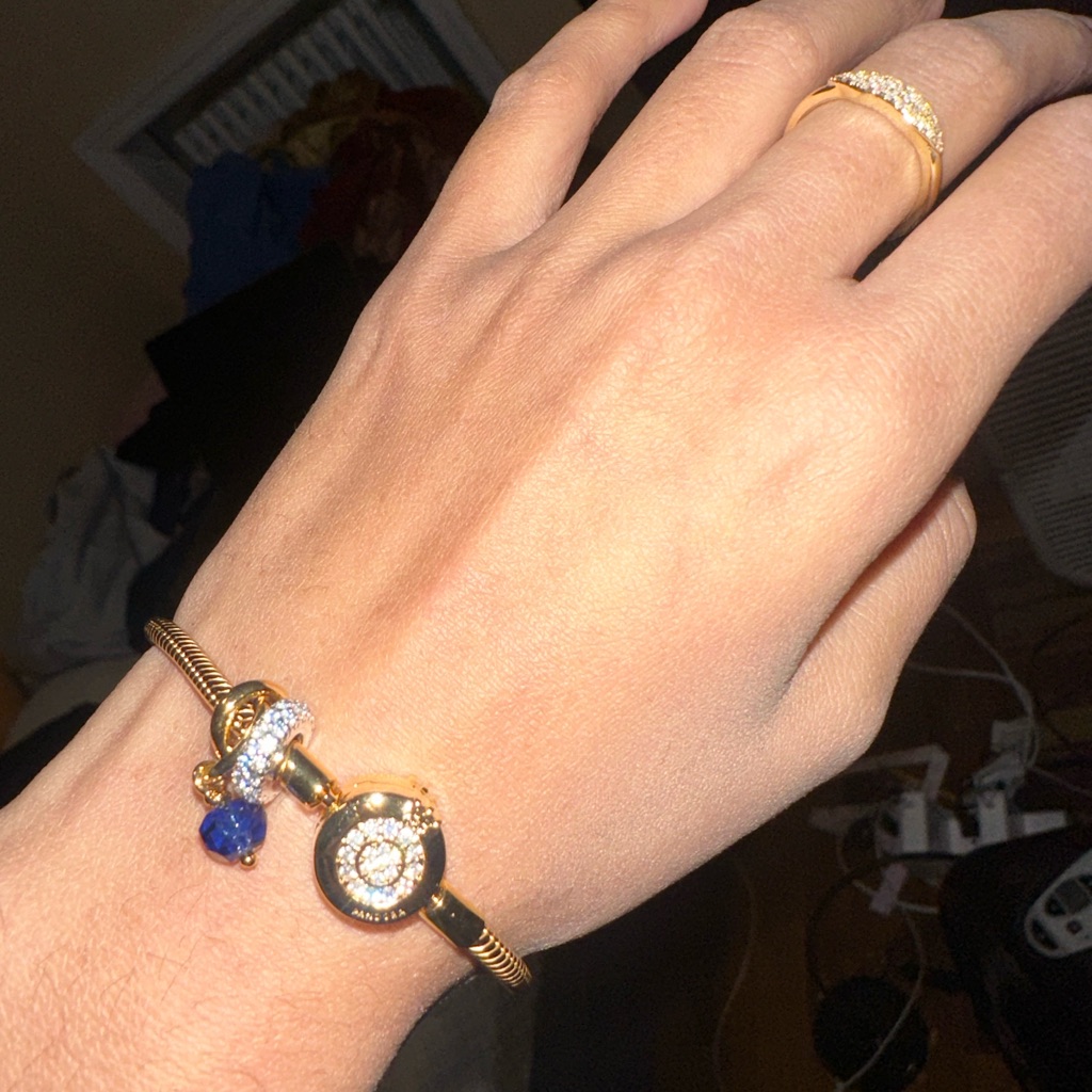 Pandora Gold Bracelet With Blue Charm